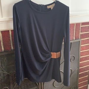 Michel Kors bran new never wore but the leather deformed.